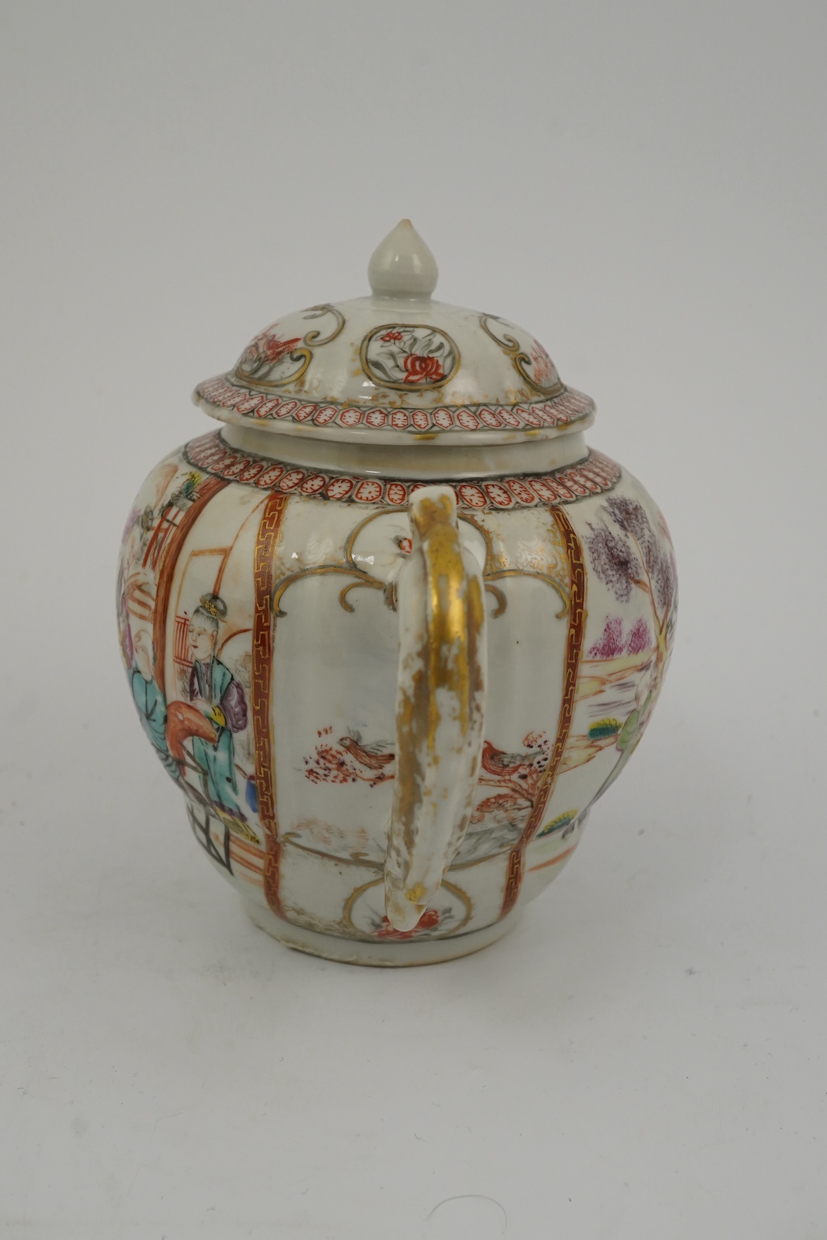 A Chinese famille rose ‘mandarin’ ogee shaped teapot, Qianlong period